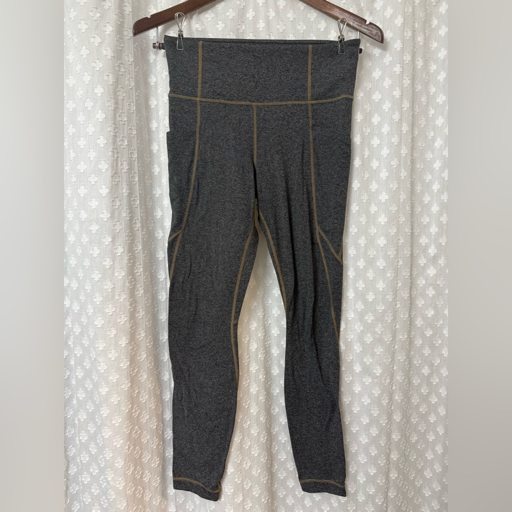 Athleta Salutation Stash Pocket 7/8 legging Heather Gray with Contrast Stitching